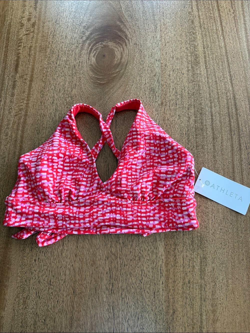 Athleta Coral Pink & White Patterned Cross-Back swim top.